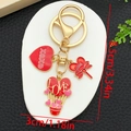 Dettaglio di ciondoli portachiavi in smalto a cuore con dimensioni di 8,5 cm per 3 cm - Stile Palloncino a Cuore Rosso Smaltato (ER1280)