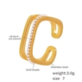 Detail view of 0.6cm wide 18k gold plated stainless steel ring with white shell beads - Gold Shell Pearl Style