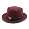 Close-up of wine red wool pork pie hat with ethnic woven band and silver bull skull charm - M (56-58cm) / Burgundy