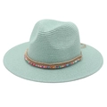 Detail of mint green woven straw hat with colorful beads and natural jute rope cord - One Size / Mint Green