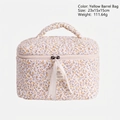 Beauty case giallo trapuntato a fiori con manico superiore e misura 23x15x15cm - Borsa a barile / Giallo