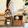 Cute raccoon plush crossbody bag with brown faux fur and a striped long tail - Small Shoulder Bag Style