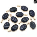 Oval blue goldstone pendants set in gold plating on a clean white background - Blue Sand Stone (Synthetic)
