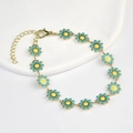 Minimalist daisy chain bracelet in gold with teal green and yellow enamel petals - Large Flower Bracelet / Green