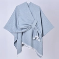 Light blue minimalist knit poncho shawl with fringe hem detail in a knotted style - Speckled with White Fringe / Blue Gray