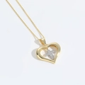 Collier cœur doré avec pendentif croix argentée et chaîne fine en or pour femme - Croix