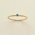 Minimalist gold band ring featuring a round bezel-set blue December birthstone - US 7 / September/Blue Zirconia