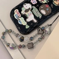 Detail of colorful beaded phone strap with laser beads and wave-edge iPhone case - Houndstooth Beaded Strap