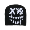 Close-up of black knitted beanie with white graffiti skull face and soft woven texture - M (56-58cm) / Black & White