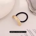 Elastic hair tie with 5.5cm golden hammered metal plate in minimalist vintage style - Single Row Pleated Gold
