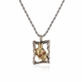 Pendente teschio con corona dorata e gemme rosse su catena d'argento a treccia - Cornice Argento Teschio con Corona d'Oro