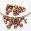 Metallic gradient skull beads for DIY jewelry making in gold, red, and purple colors - Brilliant Purple