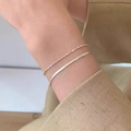Elegant double-layered silver bead and snake chain bracelet for a minimalist stylish look - Silver Round Bead Snake Double Layer (MY36900)