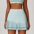 High-waisted light blue pleated tennis skirt with double-layer hem and stretch fabric - S / Cream Green
