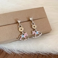 Detail of silver rocking horse earrings with heart zircon and colorful enamel finish - Silver-Pink