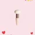 Detail of mushroom head makeup sponge with pink handle and silver ferrule - Single Pack / Rose Gold Tube + Beige Mushroom Head
