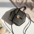 Black pentagonal leather crossbody bag with gold stitching and circular metal lock - Black