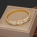 Macro shot of gold stainless steel eye bangle with turquoise stones on jewelry box - Eye Turquoise Rhinestone Style (5#)
