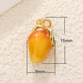 Macro view of mango-shaped enamel pendant showing 15mm height and 9mm width dimensions - Mango