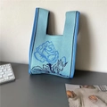Light blue knit tote bag featuring dark blue rose jacquard pattern and soft texture - Sky Blue Rose