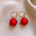Elegant red matte sphere drop earrings with golden rings on beige textured fabric - 126# Matte Red Ball Ear Clip