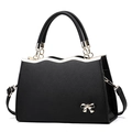 Elegant black Saffiano leather tote bag featuring a gold bow buckle and wavy top edge - Black