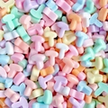 Macro shot of colorful T-shaped resin alphabet charms in pastel macaron colors for DIY - Letter T (Random Mixed One) / Small