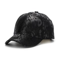 Detail of black faux leather baseball cap featuring textured animal skin pattern embossing - One Size(Adjustable) / Solid Black Animal Embossed Texture (E)