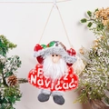 Detail von Plüsch-Weihnachtsmann mit Feliz Navidad-Schriftzug vor festlichem Hintergrund - Neuer Winkender Anhänger Weihnachtsmann