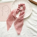 Detailed close-up of pink chiffon hair scrunchie with gold stars on white porcelain plate - Dusty Rose With Gold Stars