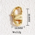 Macro detail of a 22.9mm gold lobster clasp with spring mechanism for DIY jewelry - Gold Polished Unique Clasp