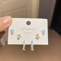 Detailed macro view of S925 silver earring set with blue enamel stars and pearls - 16# Silver and Blue (6 Pairs)