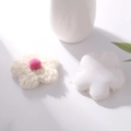 Close-up of white plush fabric flowers with pink center on minimalist white background - 8.5cm Single-sided (Turkish Curly) / Off-white with Pink Ball