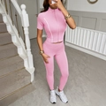 Pink Y2K athletic set with short sleeve zip-up top and white striped gym leggings - S / Pink