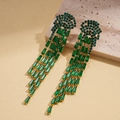 Detail of emerald green zircon jellyfish tassel earrings with long gold fringe chains - Emerald Gold Tassel / Green