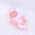 Realistic 20cm newborn baby doll in pink polka dot outfit on white plush background - Light Pink Polka Dot