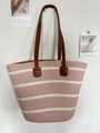 Pink and white striped woven tote bag with brown leather handles on a minimal wall - Pink Wide Stripe