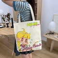 Cremefarbene Canvas-Tragetasche mit gelbem Cartoon-Mädchen-Aufdruck und NINE Times Text - Sternenlicht Niu Niu / Kein Reißverschluss Keine Innentasche