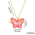 Collier papillon en acier titane avec cœur en zircon rose et détails d'étoiles dorées - Rouge