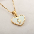 Golden heart necklace with white mother-of-pearl inlay and letter O pendant - Letter O
