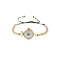 Adjustable evil eye fish bracelet with zircon pavé and tri-color beads on a white background - Multi-color