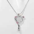 Silver mirror heart necklace with pink rose vine pendant on white display mannequin - Silver