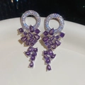 Detail of silver drop earrings with purple zircon tassels on a white porcelain dish - 61# Silver Purple Zirconia Circle Waterdrop Tassel Studs