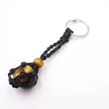 Handmade woven keychain with natural tiger eye stone in black macrame net bag - Tiger Eye + Black Mesh Keychain