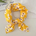 Yellow linen scarf with white daisy print tied in a loop on white background - Yellow Daisy