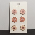Detailed view of three pairs of wooden pumpkin earrings on a white jewelry card - Halloween Pumpkin Flower Smile Face Set(MO7)