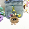Porte-clés monstre en peluche marron avec lunettes de soleil sur sac en jean - Kaki