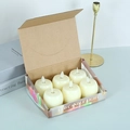 Close-up of six realistic LED apple-shaped candle lights in box with faux flame effect - 6pcs/Box / Beige