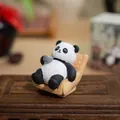 Cute resin panda figurine sitting on a wooden chair holding a tea cup ornament - Brewing Tea / Color Box