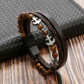 Detail of multi-layer tiger eye stone bracelet with silver anchor and magnetic clasp - Anchor Multi-layer Bracelet / Coffee + Tiger Eye